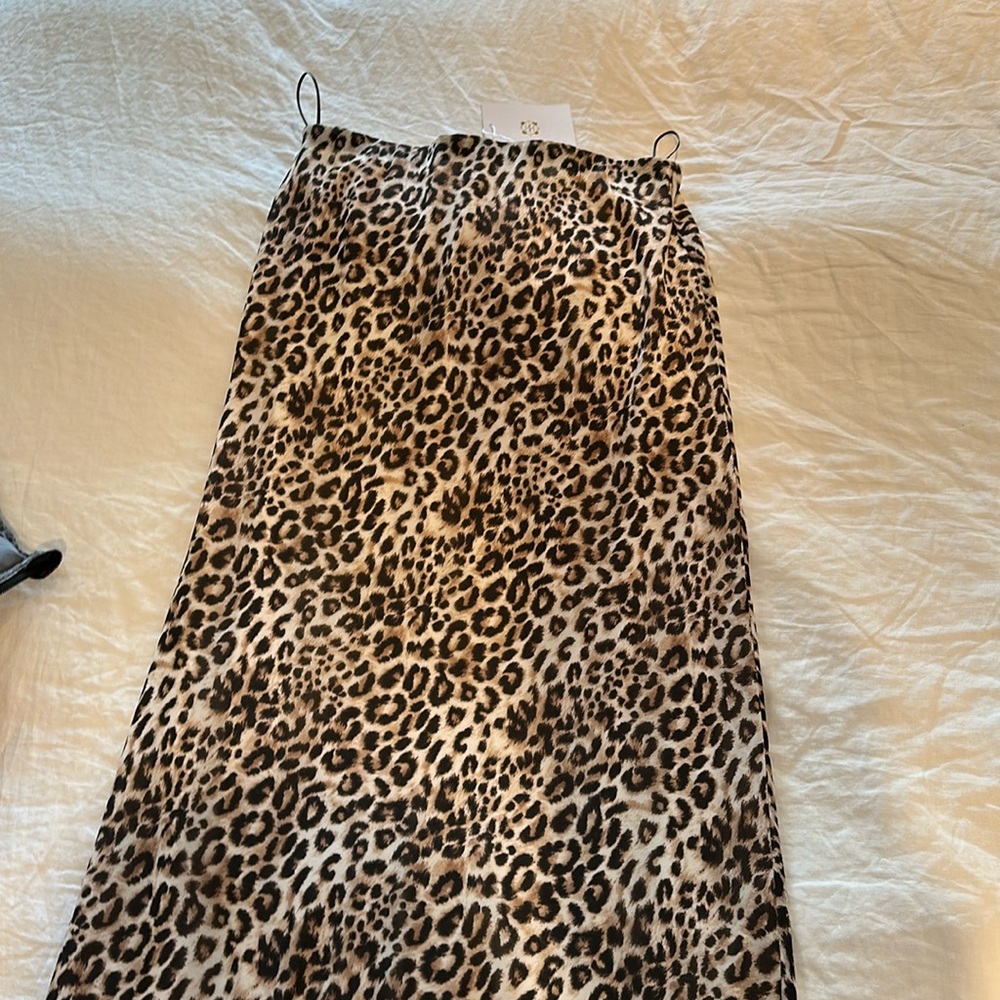 Brand new with tags. Leopard long skirt. Size medium.